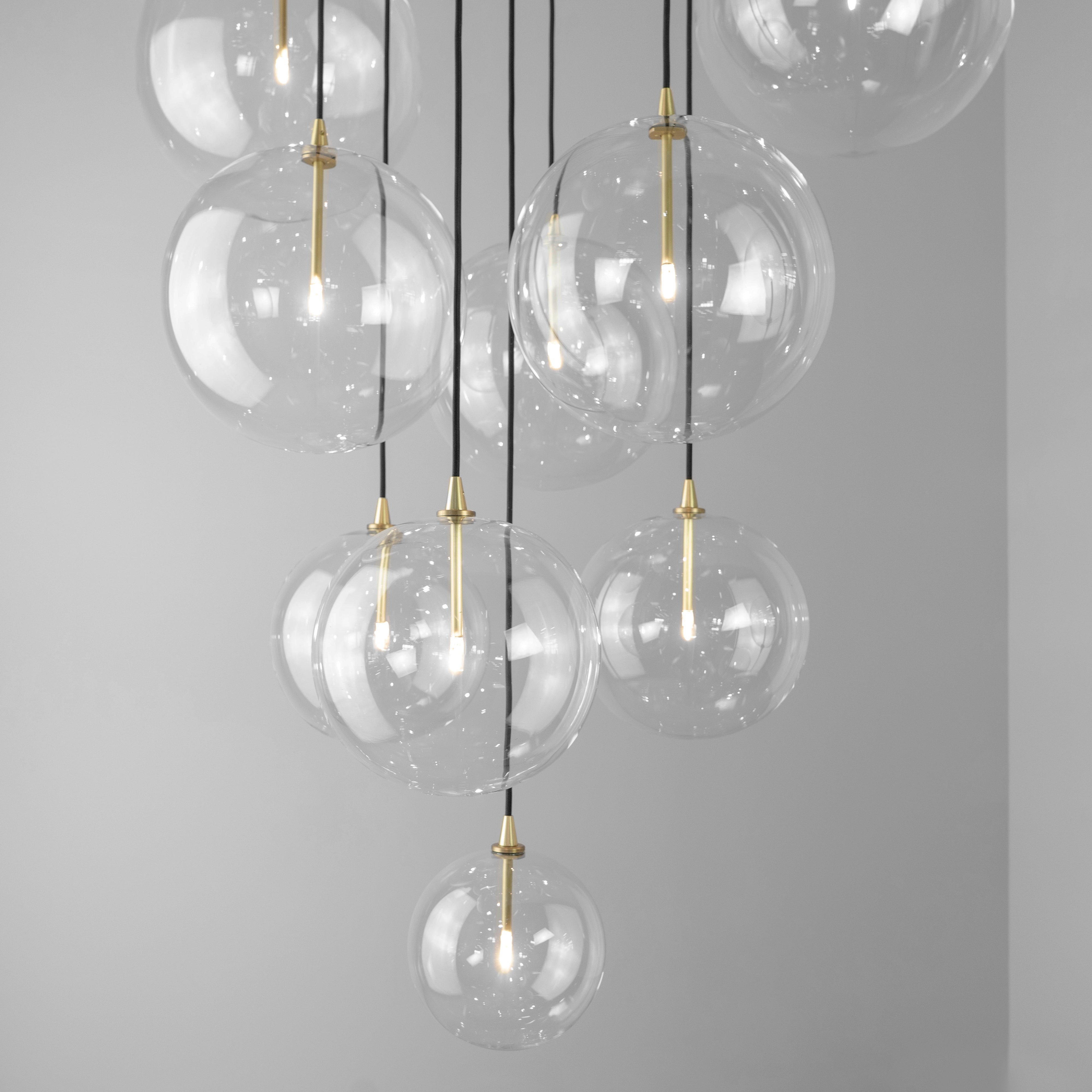 Schwung Cluster 13 Burnished Brass Transparent Globe Mix Chandelier